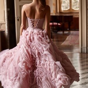 It’s Milla; Dramatically flowered tulle dress in misty pink